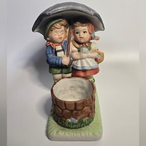 Charming Ceramic Figurine with Boy And Girl Under A Umbrella